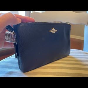 Double zip coach wristlet. Black, used three times.